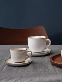 espressotasse mit unterteller, sand